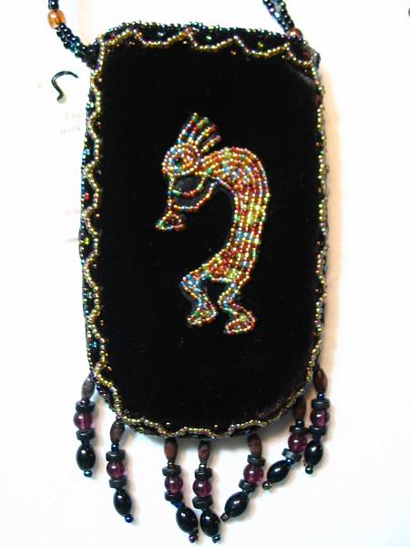 Dark brown Kokopelli cell phone holder